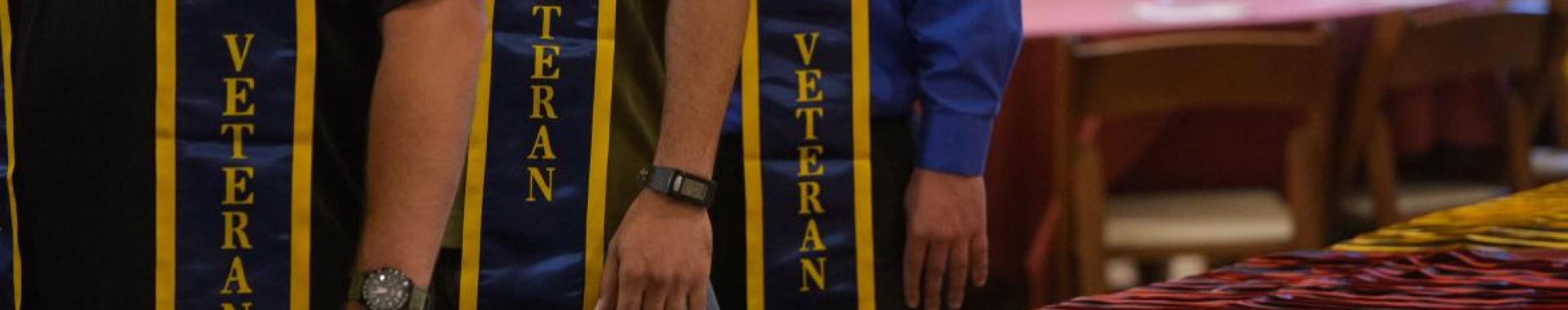 Veterans standing in line during Honor Stole Ceremony at ASU Old Main.