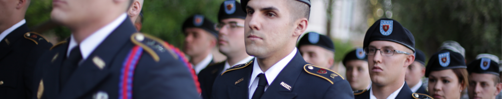 Servicemembers standing in line. 