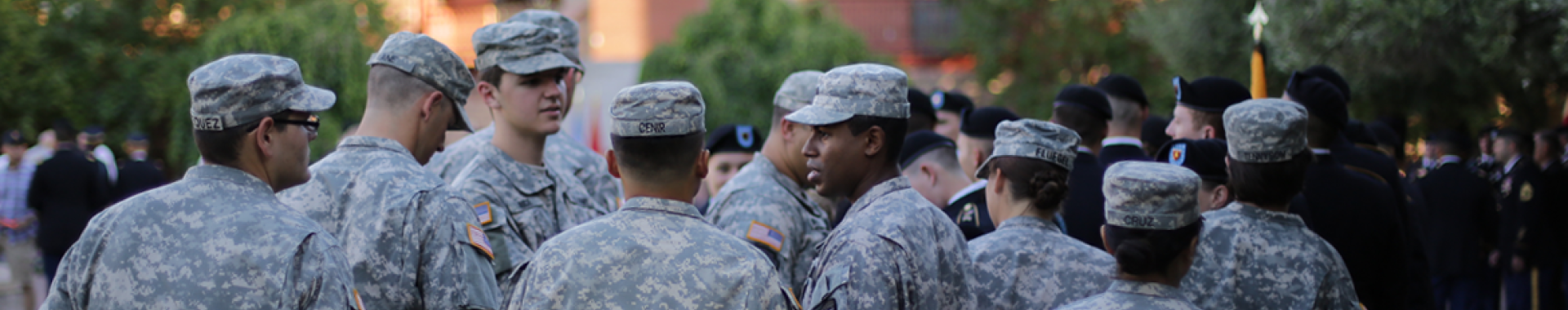Members of Army ROTC talking.